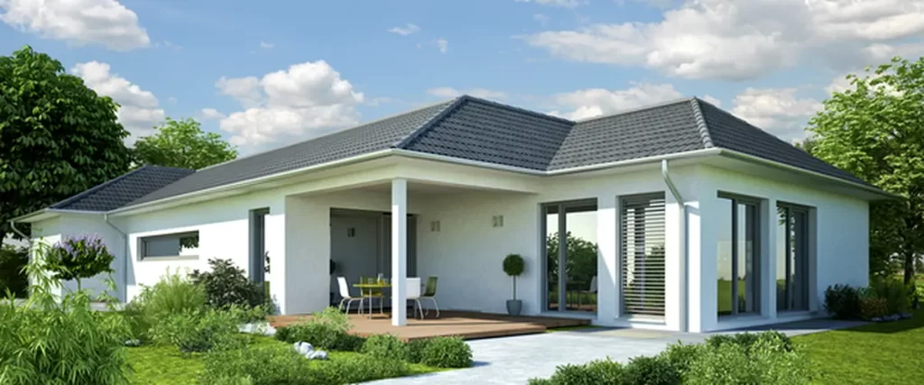 modern single story house with gray roof white exterior lush landscaping