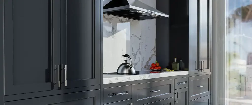 Dark modern kitchen cabinets with marble backsplash and stainless steel range hood
